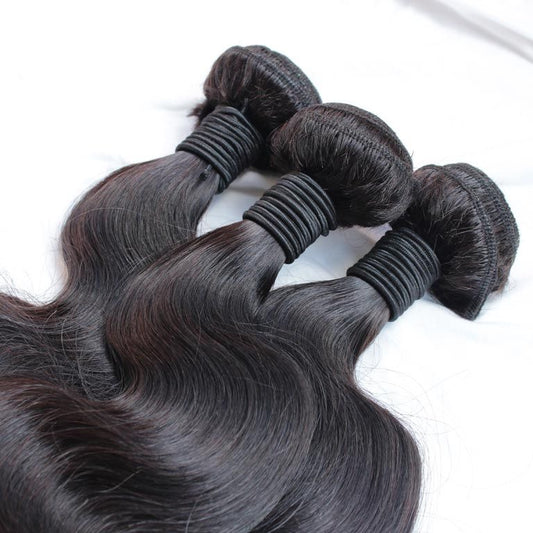 Three bundles of Bodywave on black background 