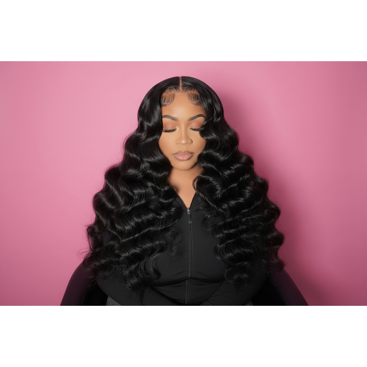 Woman wearing a black wig with a pink background